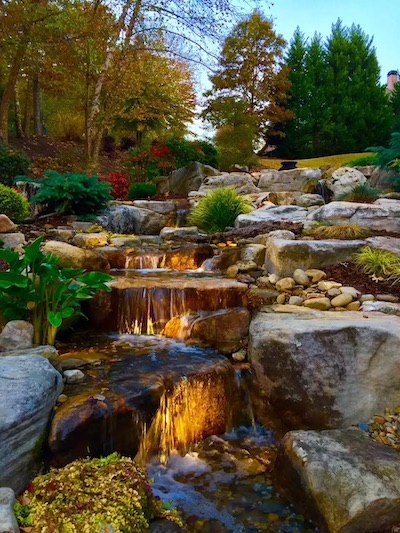 Custom water feature in a Northern Utah outdoor landscape